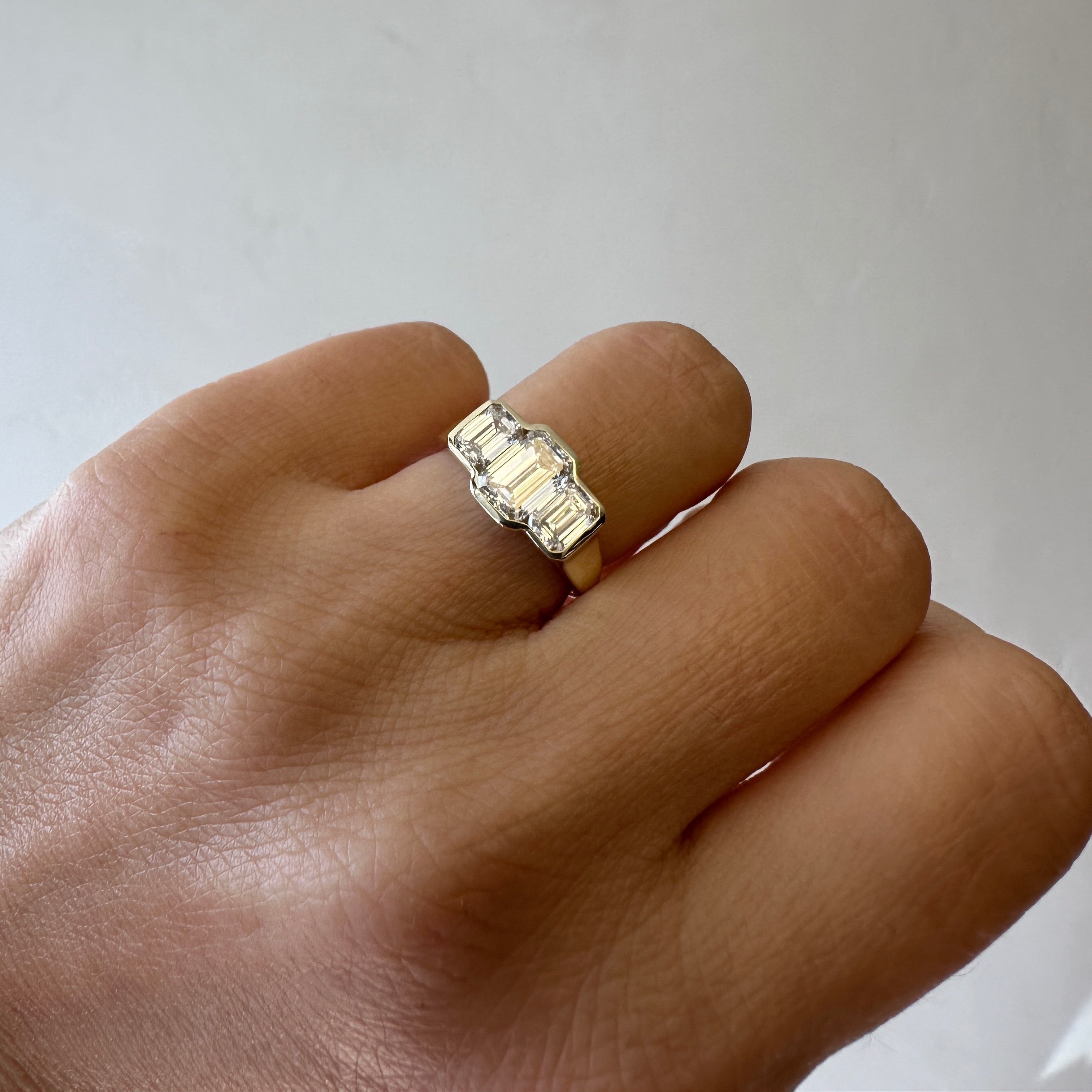 Three Stone Emerald Bezel | L