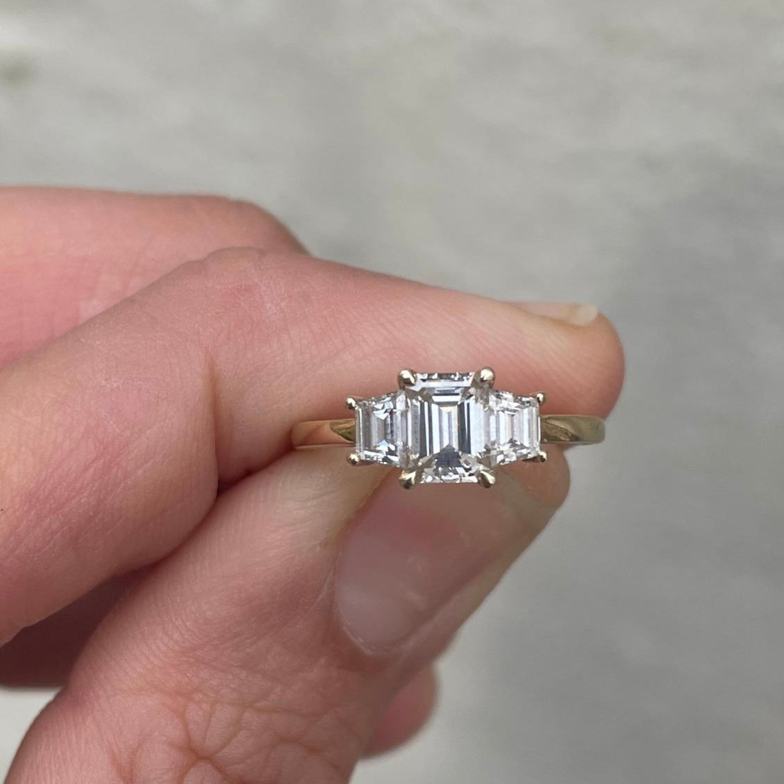 Emerald & Traps Engagement Ring